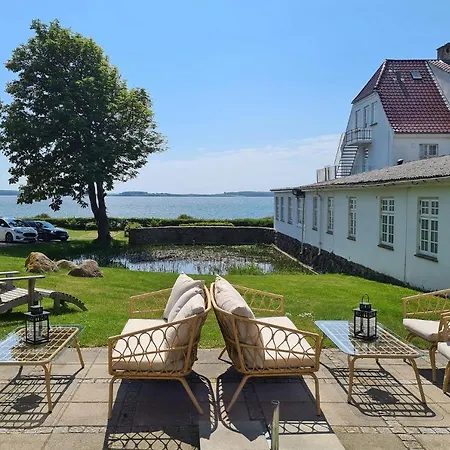 ホテル Strandhotel Rosnaes 3*